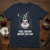 The Show Must Go On t-shirt featuring a sad clown in a vintage circus oval frame with a checkered hat