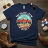 The Silver State Nevada EST. 1664 t-shirt design with retro desert landscape, mountains, and landmarks