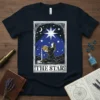 The Star Tarot Card T-Shirt design featuring a woman pouring water under a bright star and crescent moon