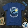 The Starry Night Black Cat Version t-shirt design featuring a black cat jumping through a starry night sky inspired by