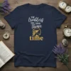 Navy t-shirt with white and gold text "The troublers you think thiave time" and hourglass graphic
