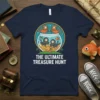 The Ultimate Treasure Hunt t-shirt design featuring scuba diving cats in a fishbowl filled with gold coins, with text below