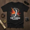 The Venom Kingdom t-shirt design featuring a detailed illustration of a striking cobra with sharp, angular orange and red graphic