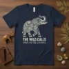 Navy t-shirt with white ornamental elephant graphic and text "The Wild Calls Spirit of the Savanna"