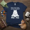 T-shirt with white text "Them: How many cats do you have? Me: Yes" and a graphic of a cat sitting