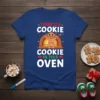 Blue t-shirt with "There Is A Cookie Cookie In This Oven" text and a gingerbread man in an oven graphic