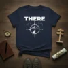 Navy t-shirt with the word THERE above a white compass design featuring mountains and constellations