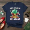 T-shirt with "There's No Place Like Las Vegas" text and Wizard of Oz-inspired graphics including a castle, poppies, and ruby