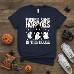 There's Some Horrors In This House Halloween T-Shirt with ghosts and haunted house graphic