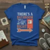Blue t-shirt with white and orange text "There's A Bathroom On The Right" and an arrow graphic
