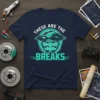 T-shirt with "THESE ARE THE BREAKS" text and a futuristic UFO graphic holding car brake rotors