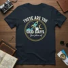 T-shirt with the quote "THESE ARE THE OLD DAYS - Your future self" and a retro rocket graphic