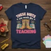 THESE BOOTS are made for TEACHING text with cowboy boots, books, and chalkboards graphic on a navy t-shirt