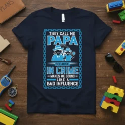 Navy t-shirt with "They Call Me Papa Because In Crime Makes Me Sound Like A Bad Influence" text and cartoon