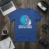 T-shirt with "THINK LIKE A MACHINE, DREAM LIKE A HUMAN" text and a split brain graphic showing circuitry and organic