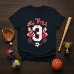 Dark blue t-shirt with "THIS ALL STAR IS 3" in red and white, surrounded by various sports balls and equipment