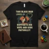 This Black Man Loves His Wife And Kids Faithfully quote on a black t-shirt, featuring a silhouette of a man