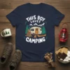 This Boy Loves Camping t-shirt featuring a cartoon bear, camper, campfire, and mountains