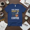 T-shirt with white text "THIS CHAOS RUNS ON COFFEE" above a cartoon tornado and a steaming coffee cup