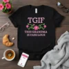 Black t-shirt with pink text "TGIF THIS GRANDMA IS FABULOUS" and floral design