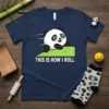This Is How I Roll panda graphic t-shirt with a cute panda character rolling down a hill