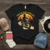Retro "This Is How I Rolled" t-shirt featuring a child on a tricycle against a vintage sunset cityscape