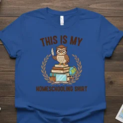 This Is My Homeschooling Shirt design featuring a cartoon owl wearing glasses perched on books, holding a quill