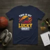 This Is My Lucky Shirt text with a leaping black panther and fiery sunset graphic on a navy blue t-shirt