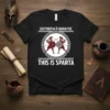Black t-shirt with "THIS IS SPARTA" text and graphic of two Spartan warriors, also includes Greek text "ΕΛΕΥΘΕΡΙΑ Ἢ ΘΑΝΑΤΟΣ"