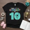 Black t-shirt with "THIS LITTLE GYMNAST IS 10" text and a gymnast silhouette for a 10th birthday celebration