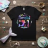 This Mermaid Is 1 birthday t-shirt design featuring a colorful mermaid and the number one, surrounded by bubbles and aquatic