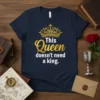 Navy t-shirt with gold and white text "This Queen doesn't need a king" and a gold crown graphic