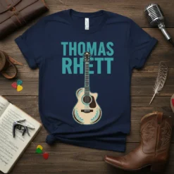 Thomas Rhett text above an acoustic guitar graphic on a navy blue t-shirt