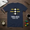 Navy t-shirt with white text "THREE IDEAS READY TO GO" and a traffic light graphic
