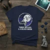 Three Wolves & A Block Moon t-shirt design with a wolf howling at a stylized moon and stars, featuring white