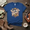 Thrift Store Queen text with a crown and vintage lamp graphic on a royal blue t-shirt
