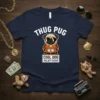 Thug Pug Cool Dog T-Shirt design featuring a pug in sunglasses and a striped outfit with handcuffs and a mugshot