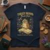Tired Moms Book Club t-shirt with owl reading book and text "Running on Chaos and Chapters"