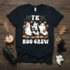 TK Boo Crew Halloween T-Shirt design with three ghosts, pumpkins, and flowers