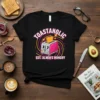 Toastaholic Est. Always Hungry T-Shirt design with a pink and silver toaster, text in pink and yellow, hearts, and swirling