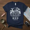 Tokyo Cityscape Skyline T-Shirt featuring Japanese text and moonlit city illustration, white on navy blue