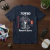 Tokyo Record Store Shiba Inu DJ T-Shirt featuring a Shiba Inu wearing headphones, holding a record, with Tokyo skyline and