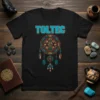 Black t-shirt with "TOLTEC" text above a colorful Aztec-inspired dreamcatcher graphic, representing ancient Mexican heritage