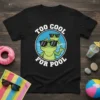 Black t-shirt with "Too Cool For Pool" text and cartoon frogs wearing sunglasses in water