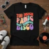 Retro graphic t-shirt with "Too Much Panic Not Enough Disco" text in colorful, wavy fonts and a disco ball graphic