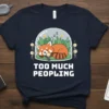 T-shirt with "Too Much Peopling" text and a sleeping red panda under a dome, surrounded by tiny figures