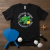 Black t-shirt with "Tortoise Island Pickleball Club" text and a cartoon turtle holding a pickleball paddle