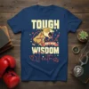 Tough Girls Don't Need Wisdom Teeth t-shirt with a fierce lioness graphic and dental imagery