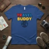 Travel Buddy text with airplane and globe graphic on a blue t-shirt, perfect for adventure and travel lovers