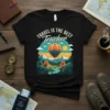Black t-shirt with "TRAVEL IS THE BEST Teacher" text above a colorful hot air balloon graphic over a landscape with